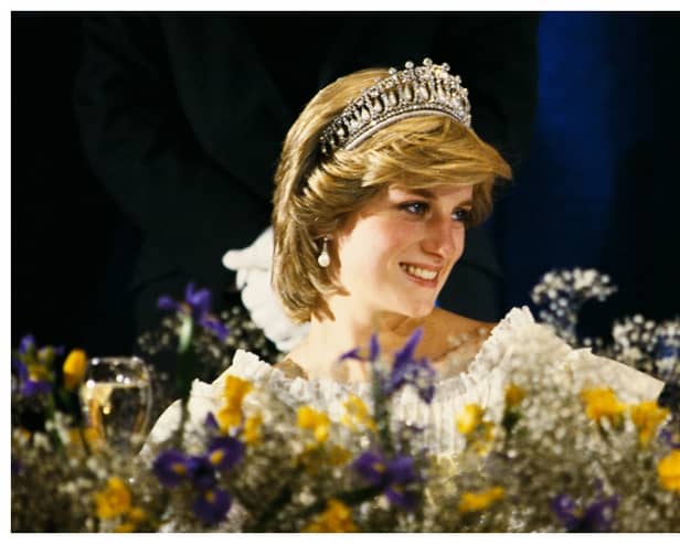 Diana, Princess of Wales, attended a banquet at the at the Hotel Nova Scotia on 15 June 1983 in Nova Scotia, Canada She wore acream satin dress by Gina Fratini and weari
 the Queen Mary Tiara.

