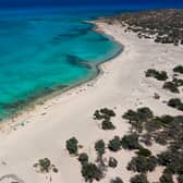 UK holidaymakers could face a £850 fine over a little known rule on Lalaria beach in Skiathos - featured in the film Mamma Mia! (Photo: AFP via Getty Images)