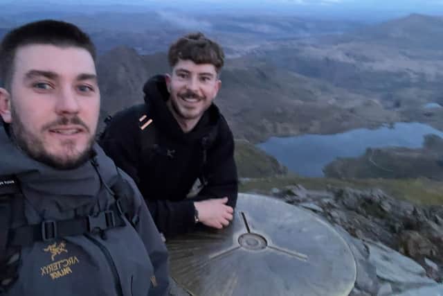 Bradley with a friend before the flight.