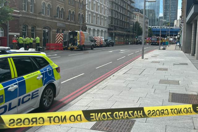 A cordon and road closure is in place on Southwark Street