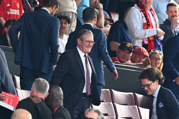 Sir Keir Starmer watches Arsenal in action against Manchester United.