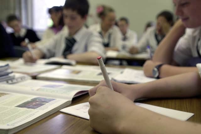 Pens down! A Level exams are now over, and the wait for results begins (Photo: Yorkshire Post Newspapers)