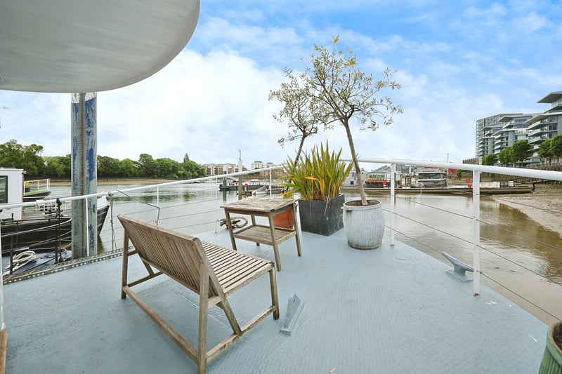 The houseboat is moored by Lightermans Walk, Wandsworth