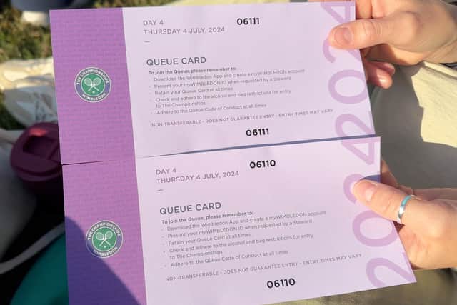 Waiting with our queue cards