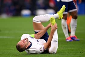 Harry Kane wins England a penalty.