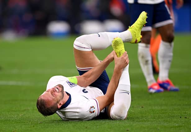 Harry Kane wins England a penalty.