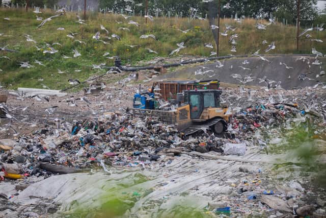 Diggers moving rubbish at Whinney Hill Landfill site