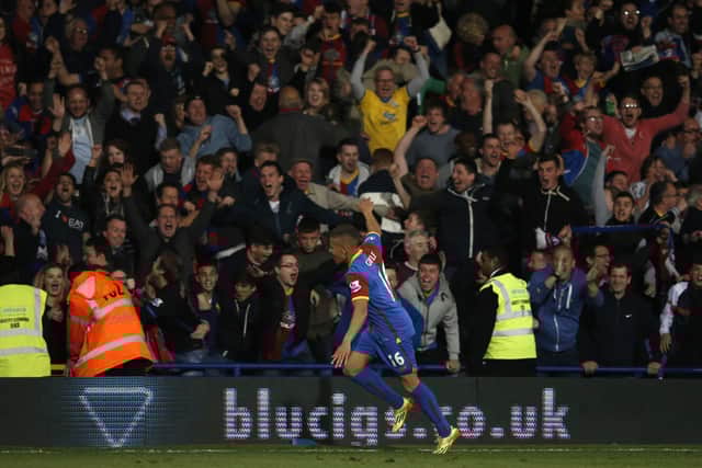 Dwight Gayle celebrates scoring for Crystal Palace against Liverpool.