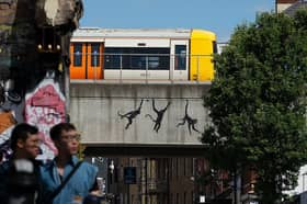 The artwork has appeared on a bridge over Brick Lane