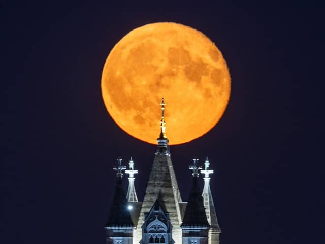 The rare phenomenon moved slowly across the city skyline on Tuesday evening.
