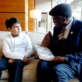 George Martin-Espin, aged 10, with Professor Chris Imafidon, chair of EIE