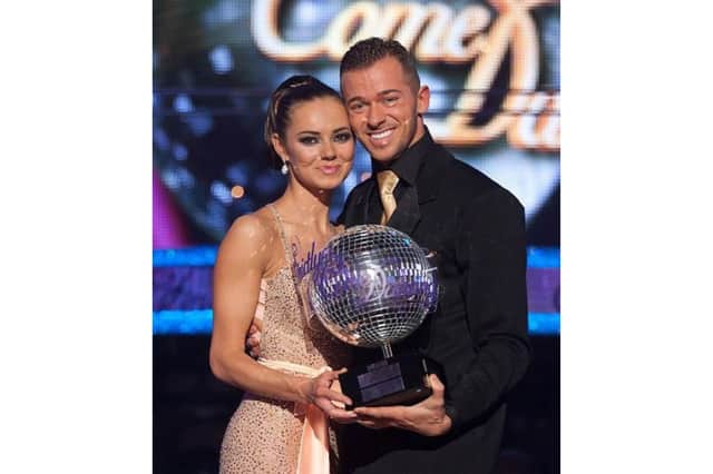 Artem Chigvintsev after winning Strictly Come Dancing in 2010 with Kara Tointon