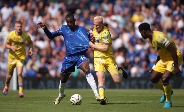 Will Hughes in action against Chelsea.