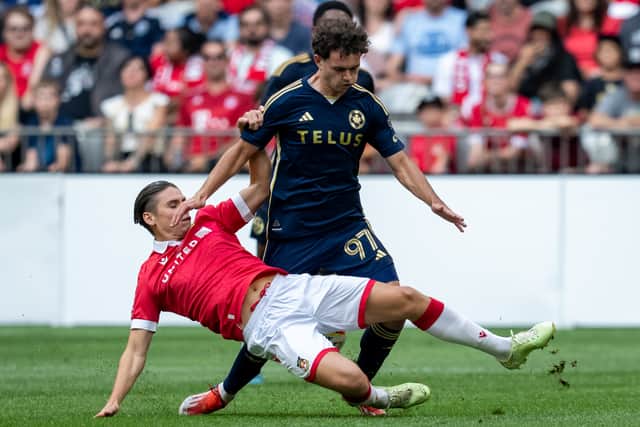 George Dobson almost moved to Hungary but ended up staying in League One.