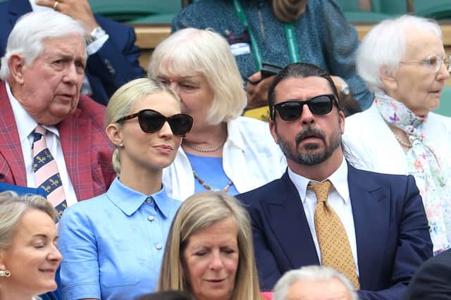 Dave Grohl, and his wife Jordyn Blum are seen in the Royal Box at Wimbledon earlier this year