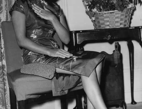 Elizabeth Taylor at a press reception at the Dorchester Hotel, held for her and her husband, Mike Todd.