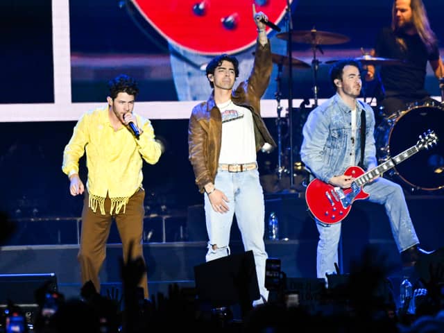 The band of brothers surprised a few fans ahead of their world tour shows at the O2 Arena this month.