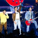 The band of brothers surprised a few fans ahead of their world tour shows at the O2 Arena this month.