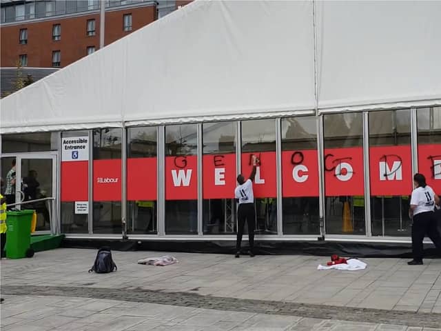 Protesters spray paint 'genocide’ on Labour conference entrance.