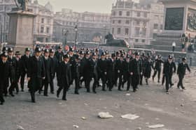 Met police officers during the Poll Tax riot in Trafalgar Square in 1990