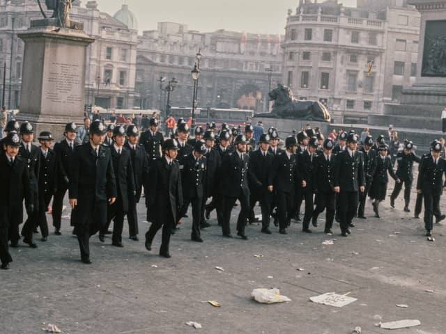Met police officers during the Poll Tax riot in Trafalgar Square in 1990