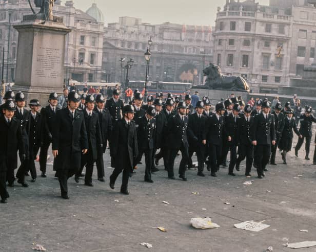 Met police officers during the Poll Tax riot in Trafalgar Square in 1990