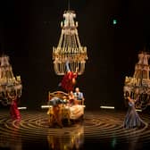 Acrobats hang from Chandeliers in Cirque du Soleil's Corteo