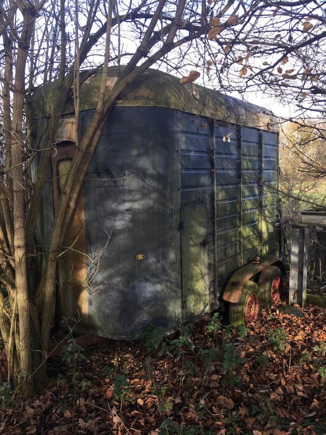 The abandoned horse box.