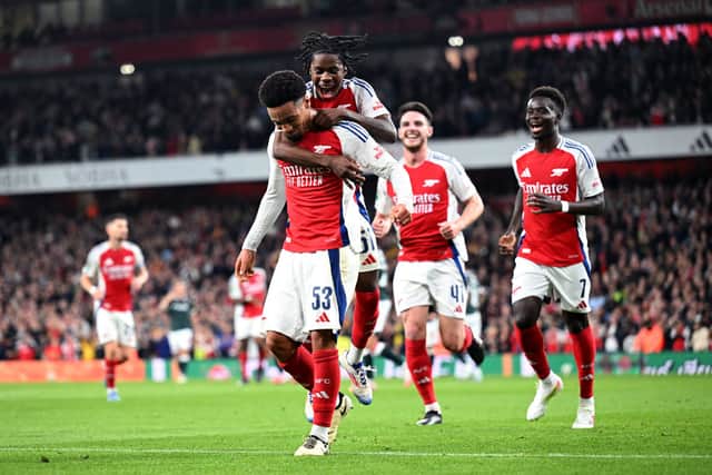 Ethan Nwaneri celebrates with Josh Nicholls after scoring his first goal for the Gunners