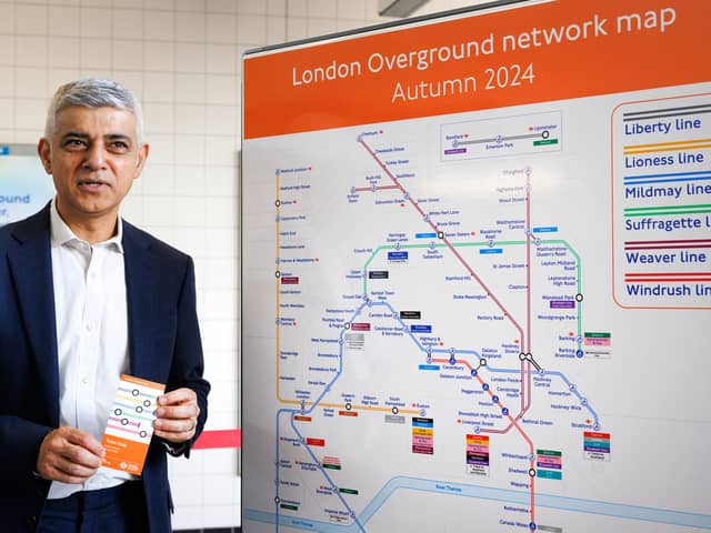 The mayor of London, Sadiq Khan with the new London Overground map