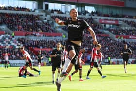 Tomas Soucek celebrates scoring his side's equaliser after the break