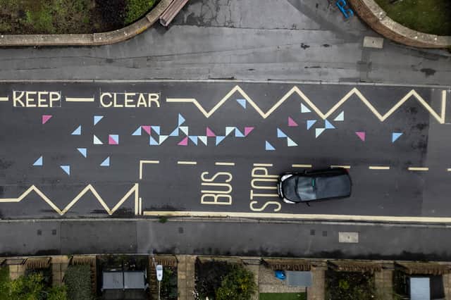 “Dangerous” colourful school road markings.