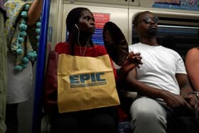 The London Underground is next-level hot. This lady has got the right idea with her personal fan. Remind me to invest.