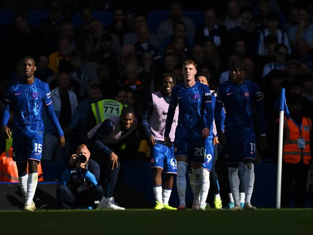 The Chelsea squad without a front-of-shirt sponsor during their 4-2 win over Brighton