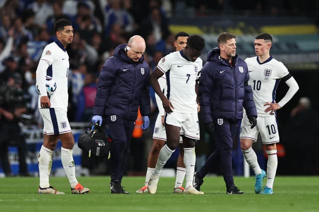 Bukayo Saka limps off the pitch in England's 2-1 defeat to Greece