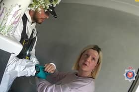Virginia McCullough is arrested by police.