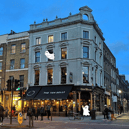 Gin and vodka aren't the only spirits you'll find in these London pubs. Pictured: The Ten Bells, Spitalfields