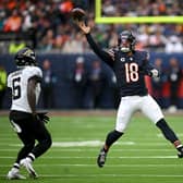 aleb Williams of Chicago Bears catches the ball under pressure from Darnell Savage of Jacksonville Jaguars during the NFL match between Jacksonville Jaguars and Chicago Bears at Tottenham Hotspur Stadium on October 13, 2024