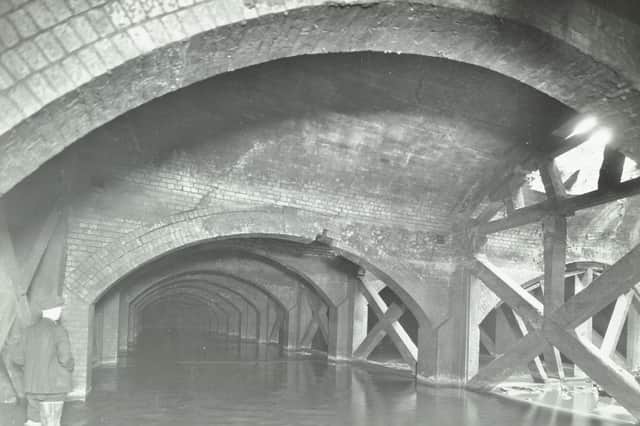 Damaged interior of the underground reservoir, Beckton Sewage Works, London, 1938. Most of it was designed by Joseph Bazalgette after an outbreak of cholera in 1853 and the Great Stink of 1858.