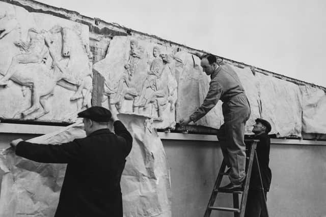 Workmen install the Elgin Marbles at the British Museum, London, May 25th 1949.