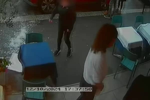 Video grab from this shocking footage shows an alleged attack on restaurant staff - in a dispute over paying a bill  at La Bella Vista in Hastings, East Sussex.