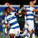 Kader Dembele celebrates scoring his side's first goal against Pompey at Loftus Road 