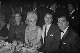 Frances Shea (1943 - 1967, far left) and her husband, English gangster Reggie Kray (1933 - 2000, far right) with actress Barbara Windsor and her husband Ronnie Knight, an associate of the Krays, at the El Morocco nightclub, owned by the Kray Twins in Soho, London, 30th April 1965.