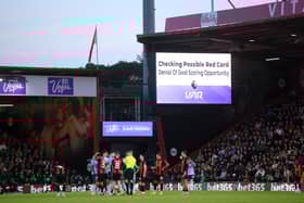 VAR played a role in the sending off of William Saliba.