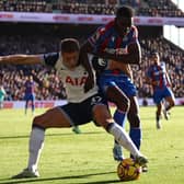 Van de Ven battles with Ismalia Sarr at Selhurst Park.