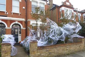 Spooky spider webs outside a house in Putney 