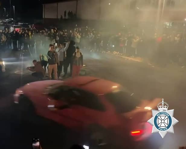 Video shows a man drifting then crashing with parked cars as well as injuring a member of the public.