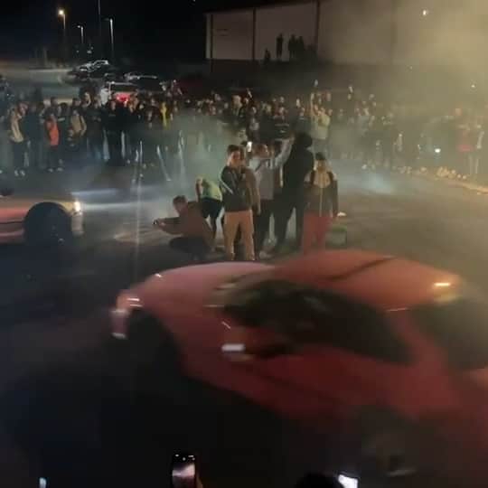 Video shows a man drifting then crashing with parked cars as well as injuring a member of the public.