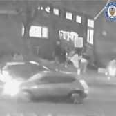CCTV captures the moment three mourners are shot in a drive-by shooting at a funeral.