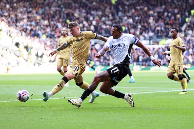Ashby in action for QPR in October.